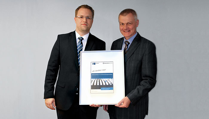 Marco Tannert, President of WaldrichSiegen, receives the World Market Leader Certificate by Klaus Gräbener